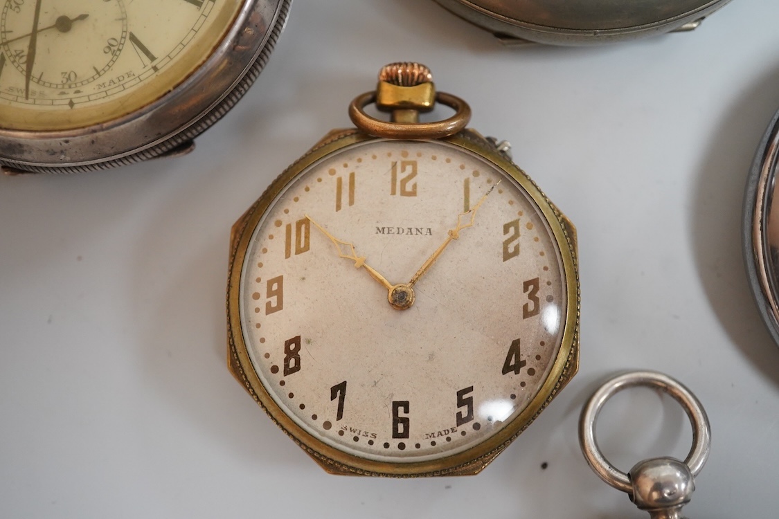 A late 1930's base metal cased Air Ministry spilt second stop watch, case diameter 60mm, together with a Swiss 935 standard open faced pocket watch, one other small white metal pocket watch and three base metal pocket wa